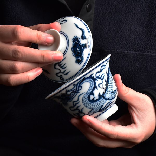 Hand-Painted Blue and White Gaiwan with Carved Dragon Motif